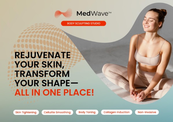 Red Light Wellness treatment room with MedWave panel and treatment bed